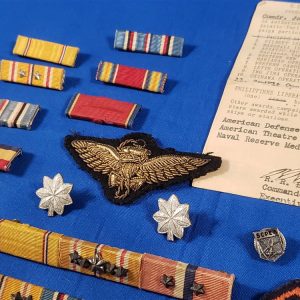 uss belleau wood grouping insignias close up