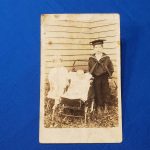 photo-of-small-child-one-with-uss-glacier-hat-on-full-uniform