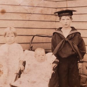 photo-of-small-child-one-with-uss-glacier-hat-on-full-uniform