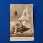 french-post-card-wwi-nurse-rppc-with-her-taking-care-of-the-wounded-in her-uniform