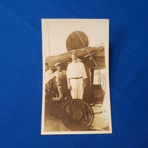 RPPC SAILOR MKII GAS MASK ABOARD SHIP. Very scarce photo of a Navy sailor wearing one of the early MKII variations of the gas mask. Excellent condition with writing of this man's name and wearing the mask on the back. Photoshoto-of-sailor-in-gas-mask-scarce-variation-aboard-ship-1918