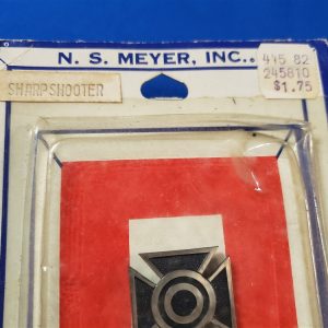 badge-shrp-shoot-meyer-1966-dated-package-back-clutch