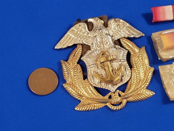 merchant-marine-world-war-two-cap-badge-insignia-and-ribbons-in-wrap-with-ranck-cap-insignia-back