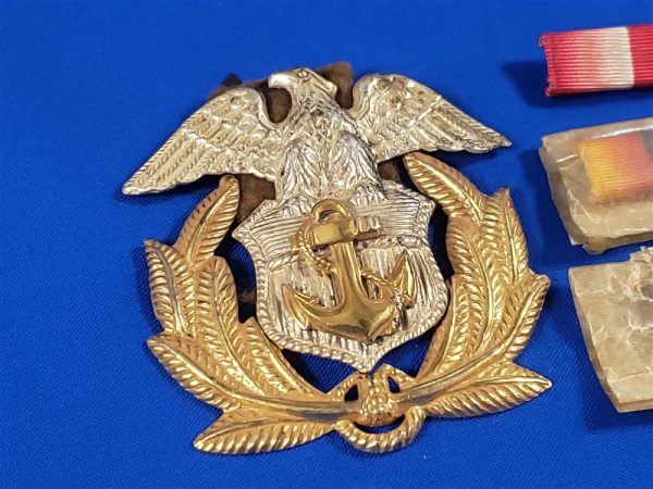 merchant-marine-world-war-two-cap-badge-insignia-and-ribbons-in-wrap-with-ranck-cap-insignia-back