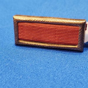 RIBBON SET CITATION RED BLUE THEATER MADE SET. Excellent pair of Citations that have the copper (not gold) and with the original plastic clips on the back. This look nice but with nice examination are NOT the quality or