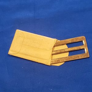 uniform-coat-buckle-in-the-original-1969-dated-package-brass