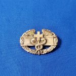 combat medic-badge-wwii-hollow-back-variation-with-original-pin