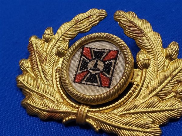 german-vet-visor-wreath-cap-badge-woven-prong