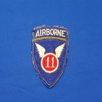 patch-wwii-11th-ab-air-borne-od-pattern-early war-with-tab