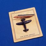 sweetheart-wwii-plastic-fighter-pin-on-factory-card-broach