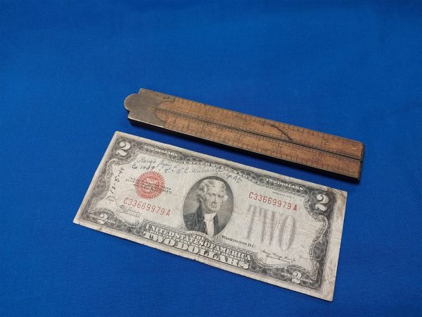 World-war-one-wooden-ruler-with-brass-hinges-used-in-map-cases-and-engineer-kits