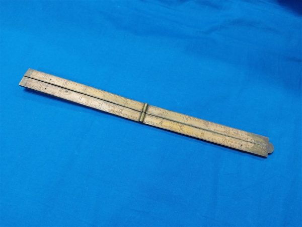 World-war-one-wooden-ruler-with-brass-hinges-used-in-map-cases-and-engineer-kits