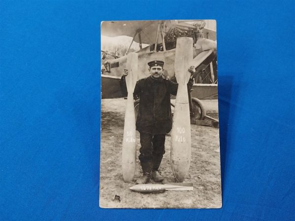 rppc-real-picture-post-card-world-war-one-german-bomber-with-3-bombs-posed