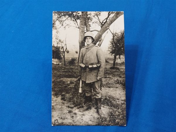 real-picture-post-card-of-german-soldier-in-the-field-with-potato-masher-gear-rifle