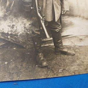 world-war-one-german-real-picture-post-card-soldier-in-field-with-backdrop-rppc