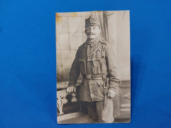 austria-hungarian-soldier-world-war-one-rppc-taken-in-vienna-with-bayonet-belt-buckle-with-eagle-and-shooting-cord