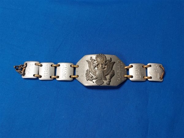 world-war-two-bracelet-made-of-aluminum-named-to-soldier-theater-of-italy-names-of-cities-large-eagle-on-front-large-size