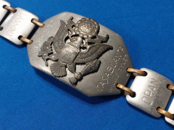 world-war-two-bracelet-made-of-aluminum-named-to-soldier-theater-of-italy-names-of-cities-large-eagle-on-front