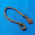 japanese-world-war-two-dagger-cord-officers-army-with-brass-weight-original-browninsh-color