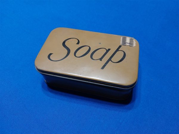 world-war-two-soap-dish-unissued-with-price-tag-of-15-cents-still-on-it-tin-construction-word-soap-on-mustard-yellow-color