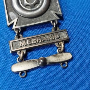 badge-shooting prop 1950s-propeller-mechanics-bar-drivers-sterling-scarce-early-vietnam-era-1st-aviation