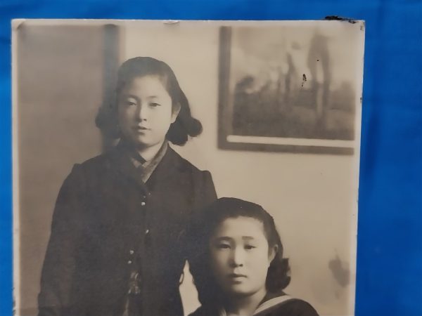 world-war-two-japanese-picture-of-woman-in-naval-uniform-sitted-beside-friend-uniform-has-rank-stripes