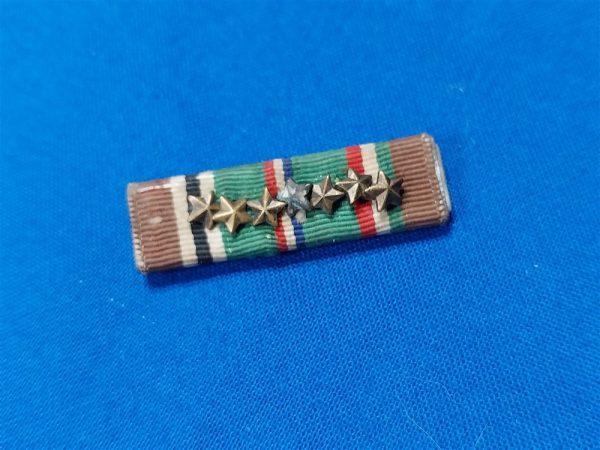 world-war-two-eto-ribbon-with-7-battle-pins-original-war-time-zinc-back-plate