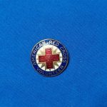 world-war-two-red-cross-pin-for-volunteer-production-with-blue-enamel-and-pin-back