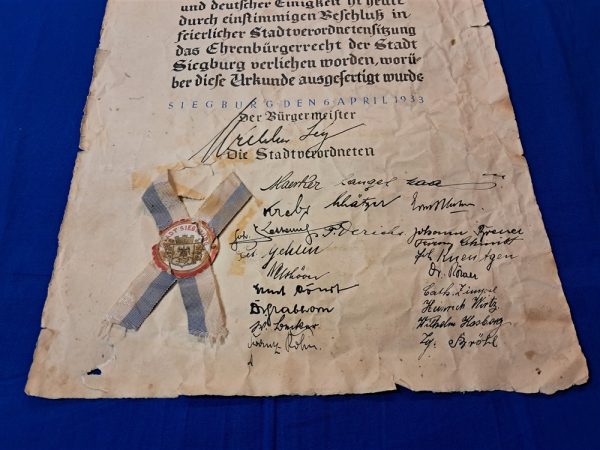 german-world-war-two-adolph-hitler-1933-dated-citizen-ship-granted-award-from-siegburg-bavaria-original-hand-coligraphy-rough-condition