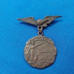 world-war-one-city-medal-from-new-jersey-bronze-eagle-with-hanging-medal-1919-dated-irvington