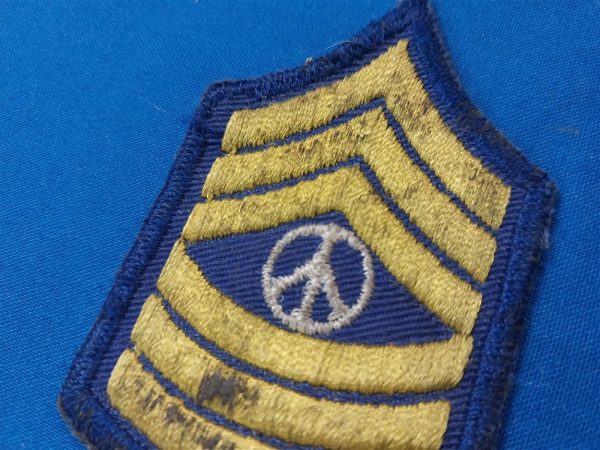 vietnam-era-original-peace-sargent-patch-stripes-with-sign-in-the-middle-yellow-and-blue-for-party-hats