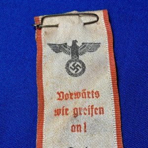 world-war-two-german-national-socialist-party-ribbon-with-we-move-forward-attack-1939-dated-with-pin