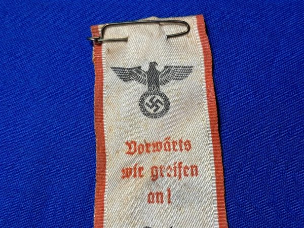 world-war-two-german-national-socialist-party-ribbon-with-we-move-forward-attack-1939-dated-with-pin