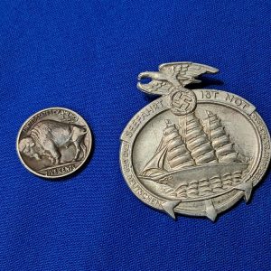 world-war-two-1935-dated-sea-faring-tinnie-german-raising-navy-personel-before-war-pin-ship-on-front-aluminum