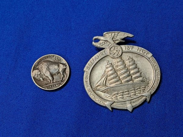 world-war-two-1935-dated-sea-faring-tinnie-german-raising-navy-personel-before-war-pin-ship-on-front-aluminum