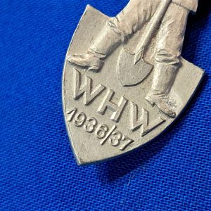 world-war-two-german-whw-pin-with-d-a-f-worker-on-front-with-shovel-1937-1936-dated-aluminum