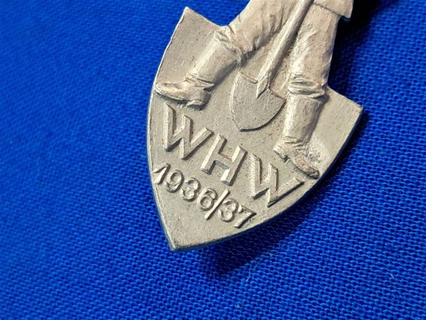 world-war-two-german-whw-pin-with-d-a-f-worker-on-front-with-shovel-1937-1936-dated-aluminum