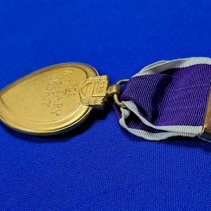 world-war-two-purple-hart-1944-us-mint-issue-united-states-navy-and-marines-no-serial-number-unissued-with-sterling-silver-mounted-ribbon