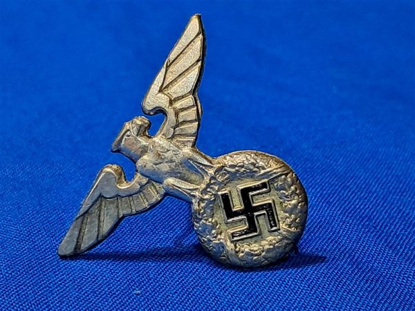 german-world-war-two-s-a-kepi-insignia-of-unknown-use-with-early-eagle-and-red-enamel-disk-in-maybe-gau-color-cap-hat