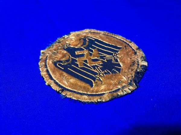 german-world-war-two-n-r-s-l-badge-sports-in-bronze-cloth-bevo-pattern-d-r-l-uniform-removed